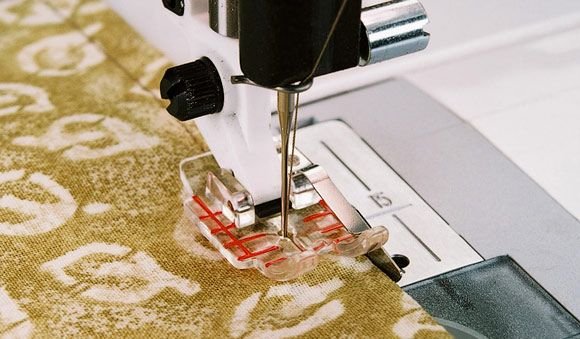 HUSQVARNA® VIKING® Clear Adjustable 1/4 Inch Piecing Foot with Guide